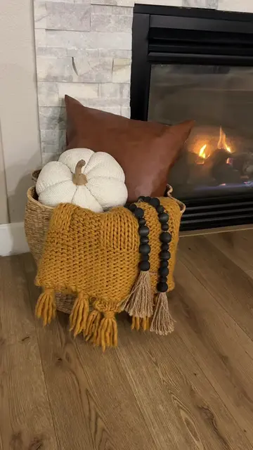 One basket. Endless cozy vibes. 🍂🤎 A chunky knit blanket, a pumpkin, and a few