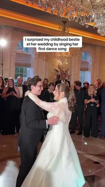 She thought it was just the wedding band singer 😅 #surprise #weddingday #reacti
