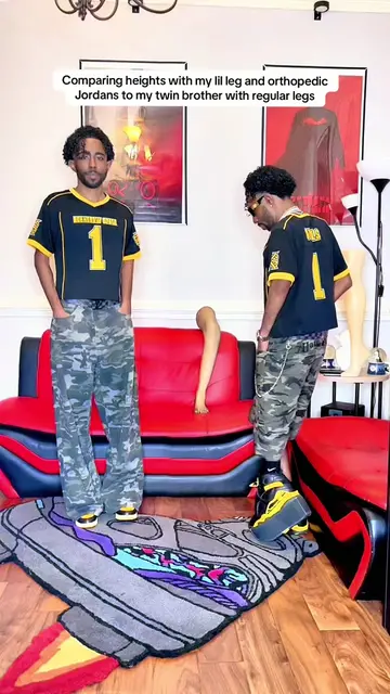 Comparing heights with my lil leg and orthopedic Jordans to my twin brother with