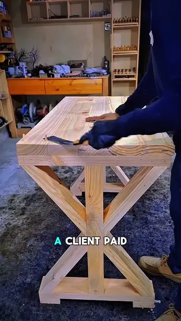build him a farmhouse trestle table.