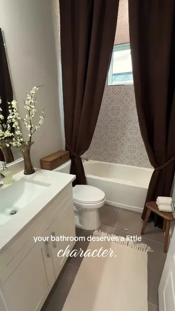 Cozy with personality. 🤎  #bathroomdecor #bathroominspo #cozyathome #homedecor 