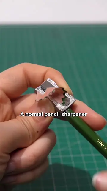 A normal pencil sharpener has one hole. This one has two. KITA-BOSHI, one of the