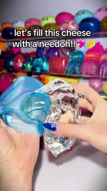 Filling a cheese squishy with a needoh!!#needoh #squishy #fidgettoys