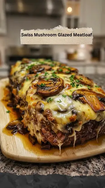 Swiss Mushroom Glazed Meatloaf 🧀🍄 Juicy meatloaf stuffed with melty Swiss chee