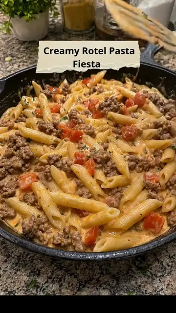 Creamy Rotel Pasta Fiesta 🍝🧀 This Creamy Rotel Pasta Fiesta is a quick and com