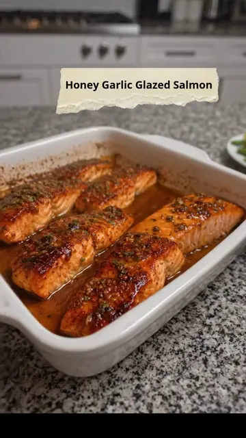Honey Garlic Glazed Baked Salmon 🍯🧄🐟 This Honey Garlic Glazed Baked Salmon is