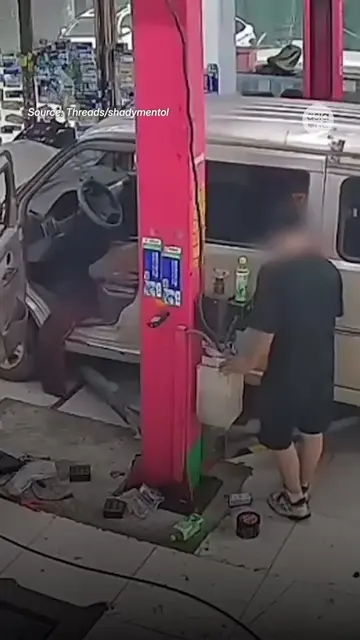 CCTV footage taken from a car workshop in China on July 27 shows a mechanic work