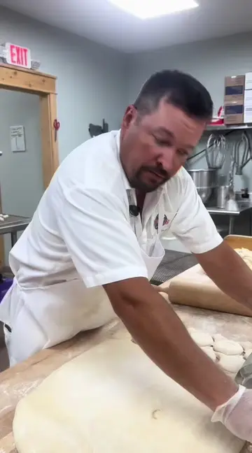 Bismarcks in the making! 🍩 Watch me use our special tool to cut them just right