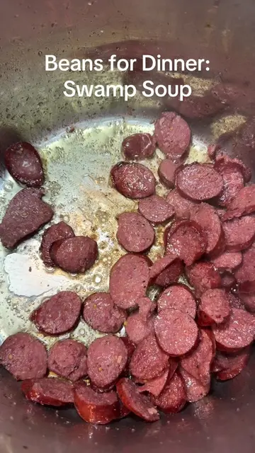 Swamp Soup 1 lb smoked sausage, sliced 1/4-inch on the bias 1 cup chopped onion 