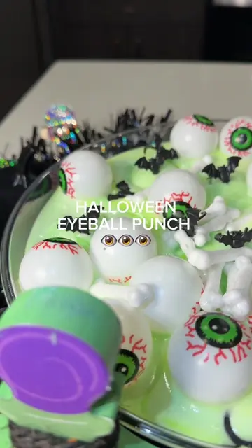 this spooky eyeball punch is the perfect addition to your Halloween festivites t