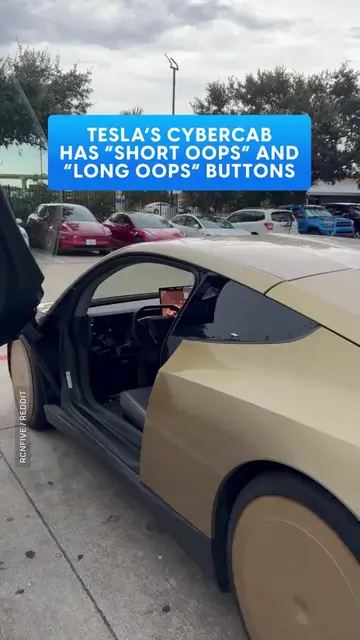 An open Tesla Cybercab door offered a rare look inside the autonomous vehicle. T