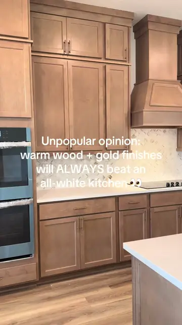 Unpopular opinion: I’ll take warm wood tones + gold finishes over an all-white k