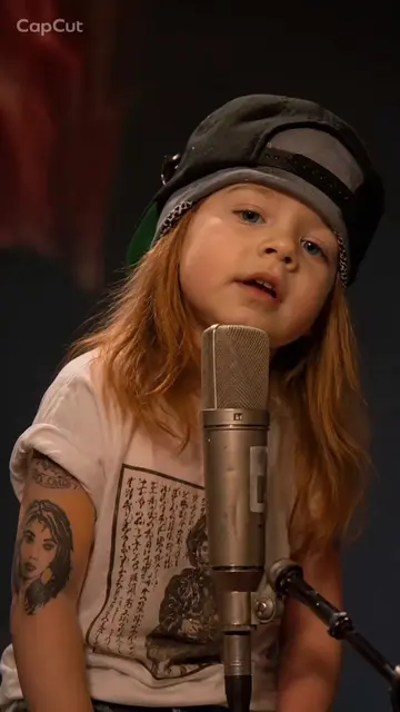 "Patience" by mini Guns N' Roses 🧸🎸🥁🎶 PS. It's a lollipop 🍭 not a cigarette