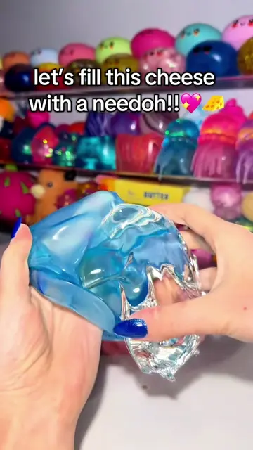 Filling a cheese squishy with a needoh!!#needoh #squishy #fidgettoys