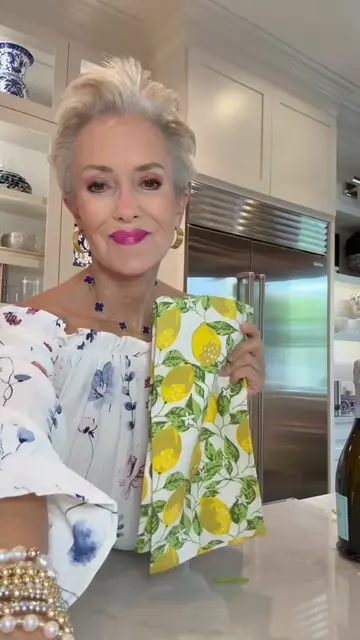 Your hostess gift just got a little more personable by using a cute tea towel in