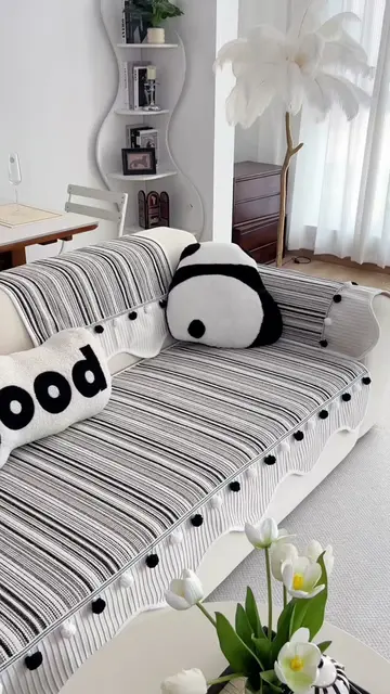 Modern black-white striped sofa cover with pom-pom trim, soft breathable fabric,