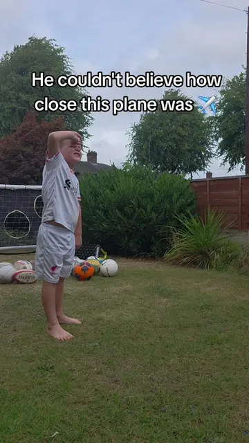 He couldn't believe how close this plane was ✈️ #funnykids #footballhumour #lfc 