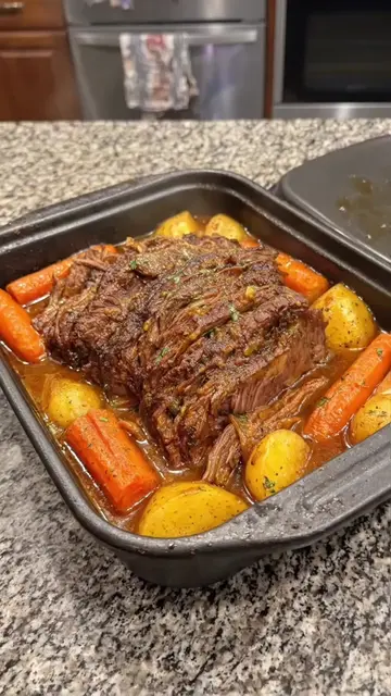 Slow-Cooked Garlic Herb Pot Roast with Carrots and Potatoes
 Ingredients:
 3½ lb