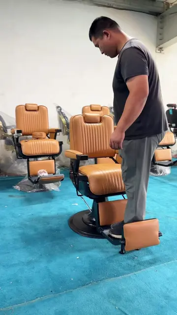 Orange barber chairs ready for shipment, real factory footage. 🧡 China factory 