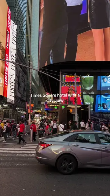 Times Square glowing outside your window all night… this was my king corner view