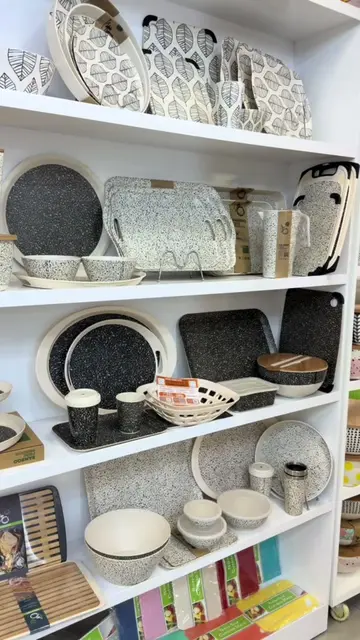 Bamboo fiber tableware sets in various designs are available at our factory stor