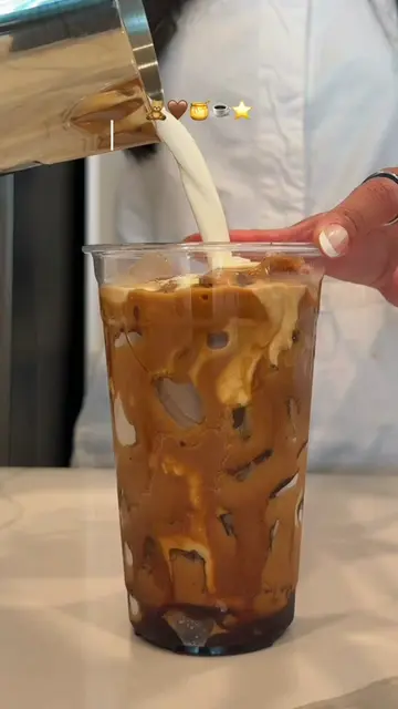 the creamiest, most delicious Teddy graham iced latte topped with caramel cold f