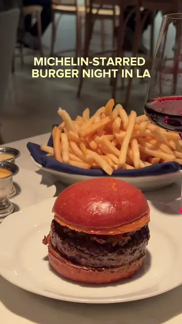 A beef and duck burger with a side of fries and a cherry milkshake might be my d