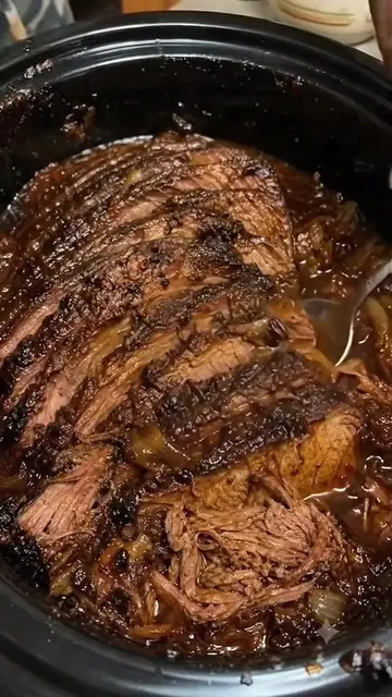 Slow Cooker Shredded Beef
 3 lb (1.4 kg) beef chuck roast
 1 small onion, sliced