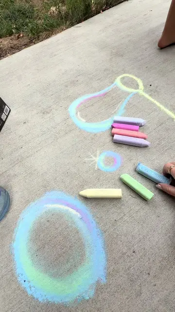 Fun and easy thing to draw with chalk! I have my daughter jump on them to pop th