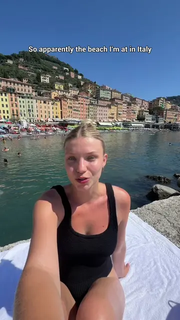 Let’s get fresh pasta on the beach in Italy! 🍝🌊⛱️#solotravel #camogli #pasta  