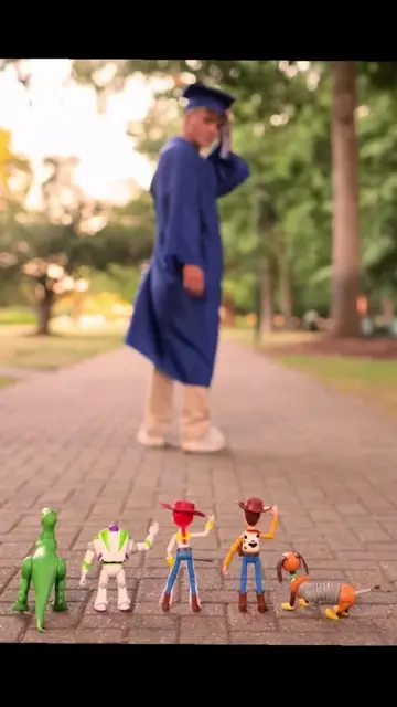 A mother photographed her son on his graduation day, with his childhood friends 