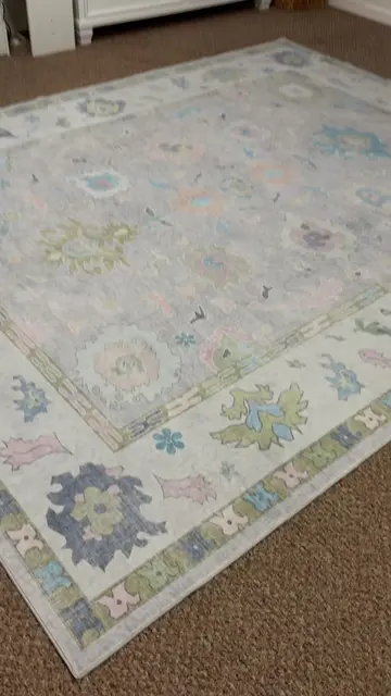Such a great rug for a really good price!! The description says light purple but