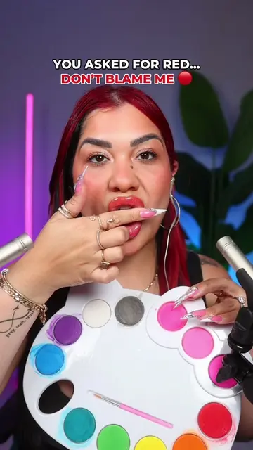 You asked me to spit paint your face using ONLY red… now you look like Elmo 😭🔴