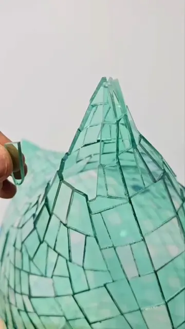 Watch how artist @colinrobertsart creates incredible mosaic pillow sculptures us