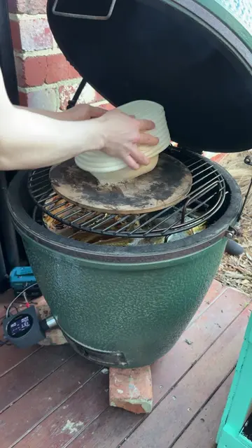 First attempt at baking sourdough on the big green egg, it actually came out bet