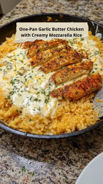 One-Pan Garlic Butter Chicken with Creamy Mozzarella Rice 😍 Full recipe is on m