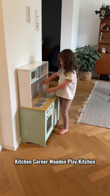 Discover the joy of playtime cooking with this Kitchen Corner Wooden Play Kitche