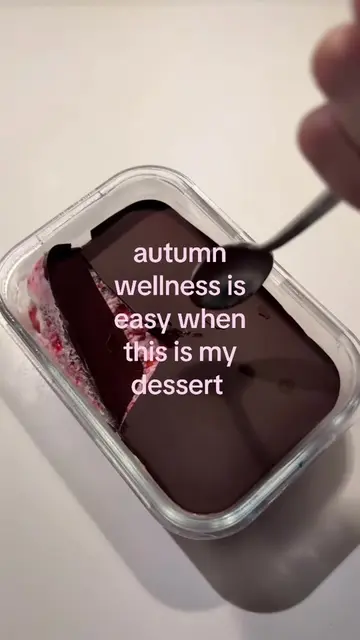 fluffy raspberry yogurt chia pudding with dark chocolate on top, and the CRACK e
