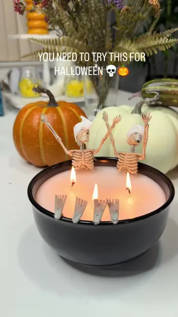 DIY Hack 🕯️ Turning simple candles into spooky Halloween decor 💀🕯️🎃 Would yo