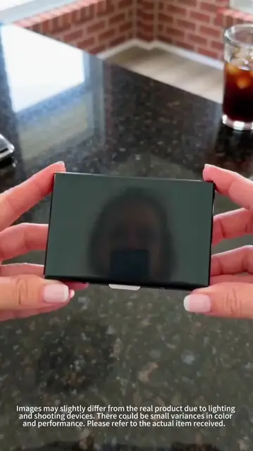 This stainless steel card holder blocks RFID skimming and fits in your pocket th