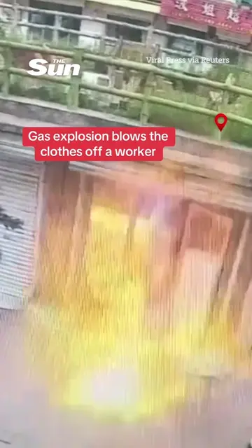 This is the dramatic moment a gas explosion blows the clothes off a worker insid