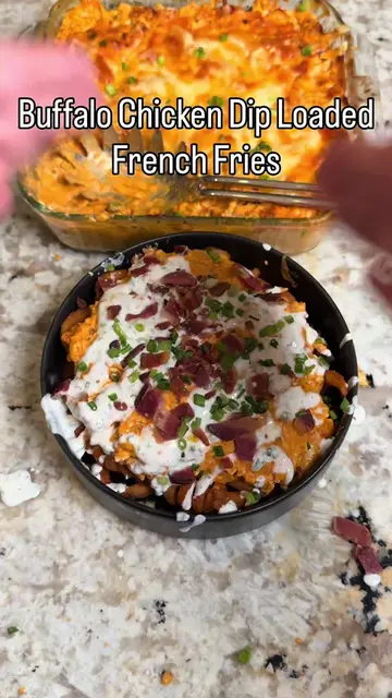 Buffalo Chicken Dip Loaded Fries.  Share with someone who needs to try this for 
