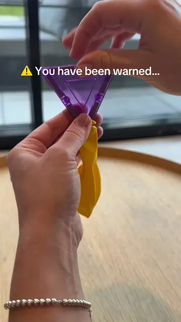 DO NOT put a magnet tile inside a balloon. Unless you want a weirdly magical act
