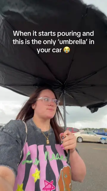 When you forget an umbrella but thankfully have a windshield sunshade in the car