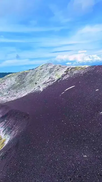 An extreme close-up of Anak Krakatau’s crater. You can see the smoke rising from