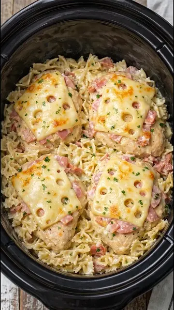 1 1/2 pounds boneless, skinless chicken breasts
 1 cup diced cooked ham
 3 clove