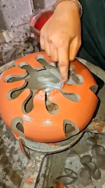 Satisfying Pottery Art & Craft Sliced live right off the spinning wheel Pure art