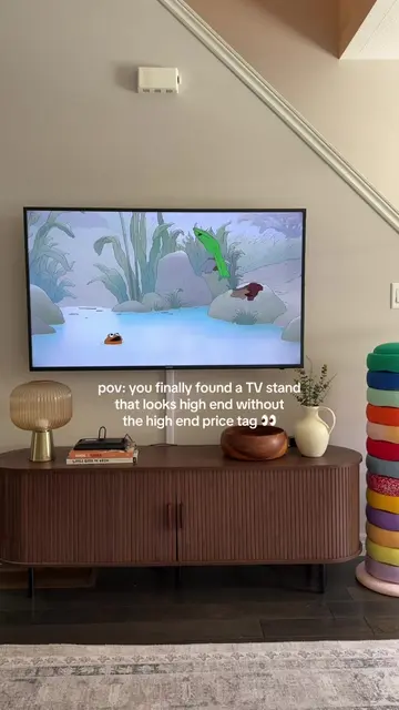 a corner of my home that I am obsessed with looking at —this beautiful TV stand 