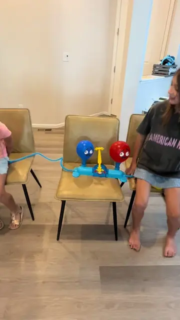 This balloon popping game = instant chaos + SO many laughs! 🎈😂 My kids are obs