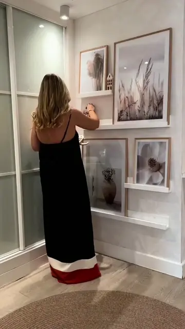 Looking for a simple way to decorate a blank wall? 🏡✨ Picture ledges make it so